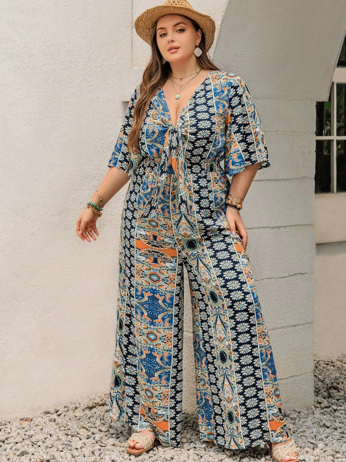 Plus Size Printed Half Sleeve Wide Leg Jumpsuit - Wellen Fashion