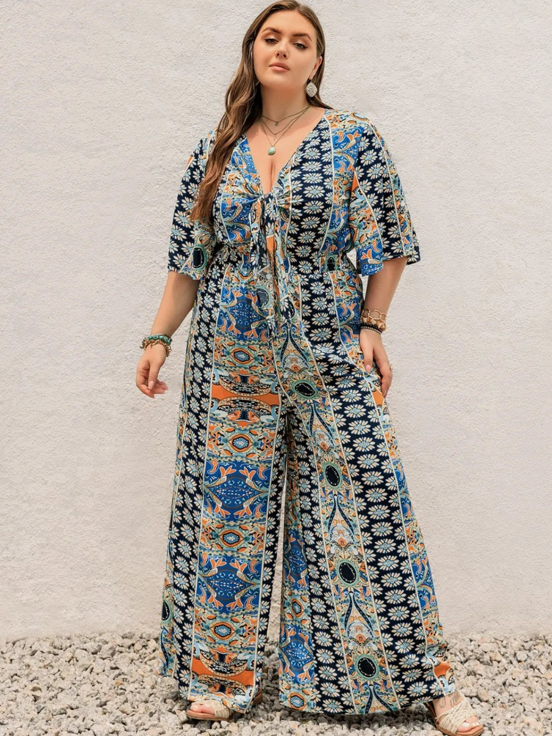 Plus Size Printed Half Sleeve Wide Leg Jumpsuit - Wellen Fashion